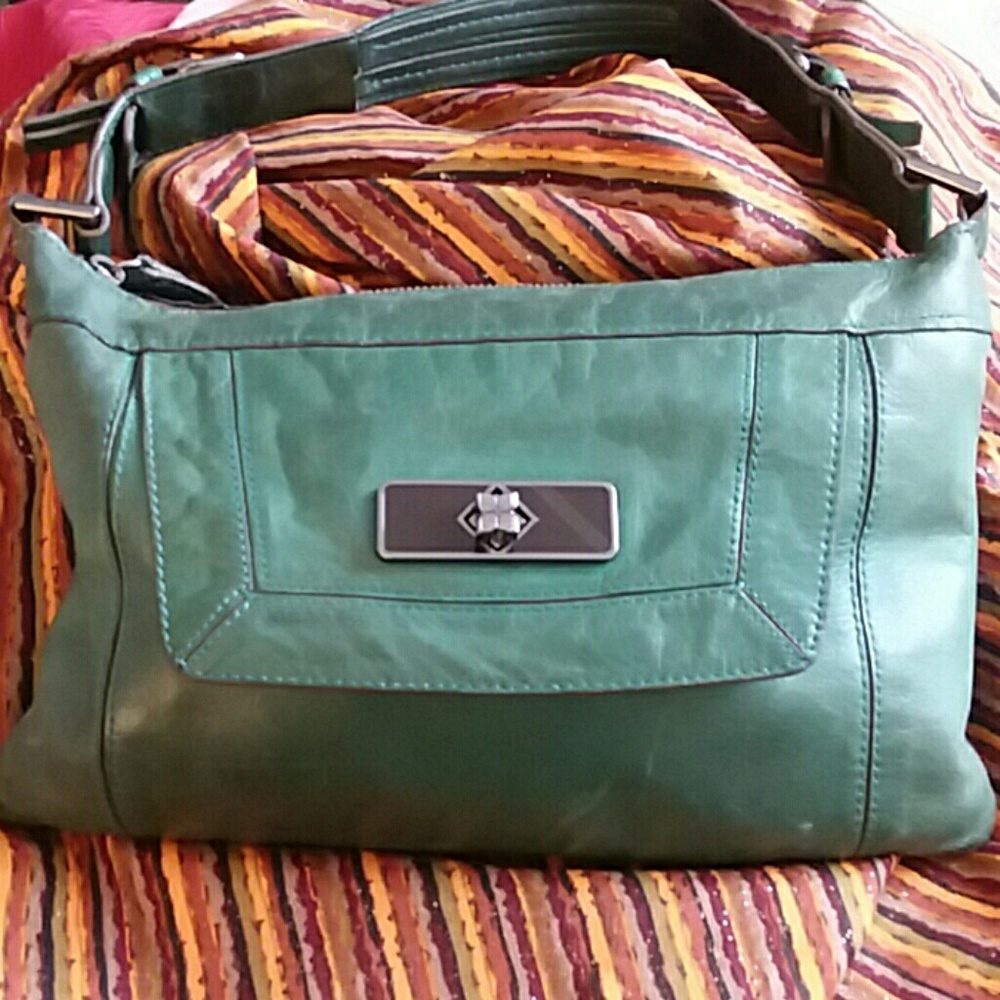BCBGMAXAZRIA Ladies green leather purse.